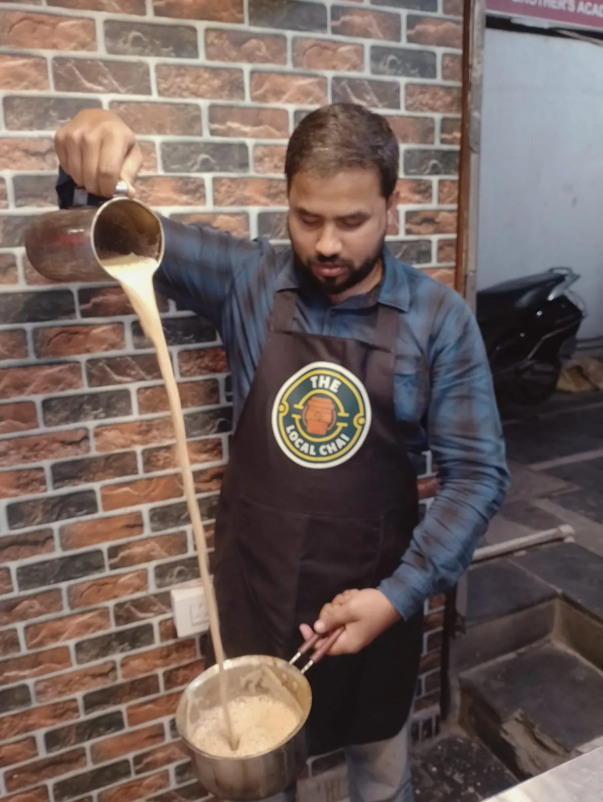 Cutting chai in a glass - steam, spices, the everyday cup