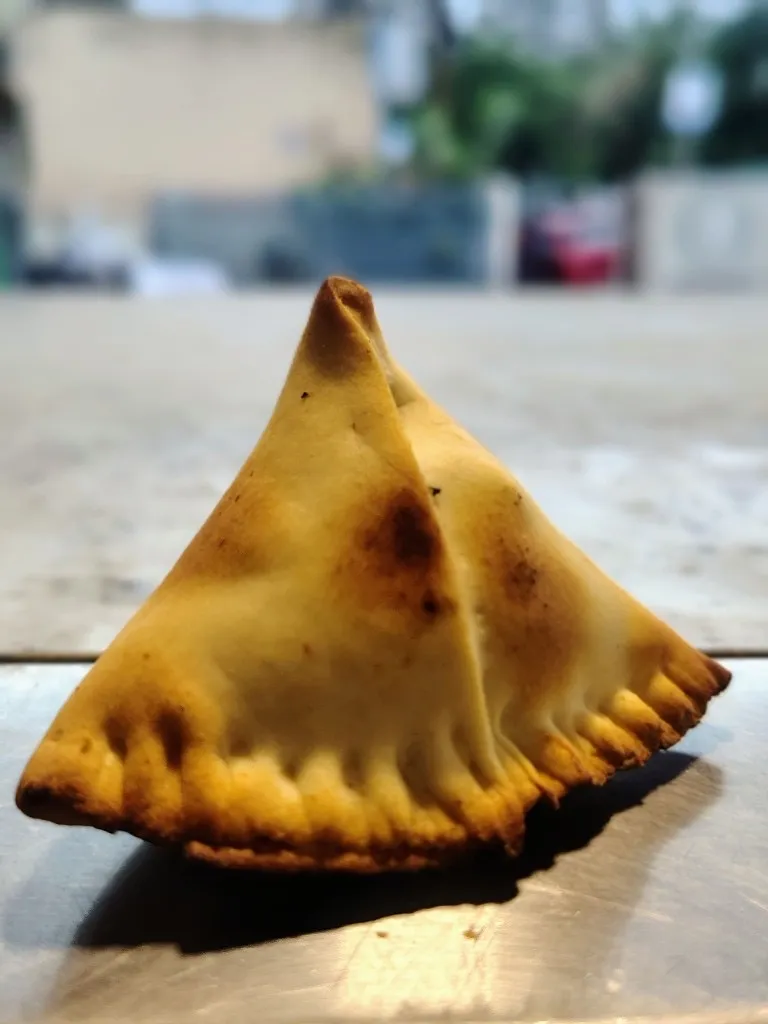 Golden fried samosas, hot off the kadhai